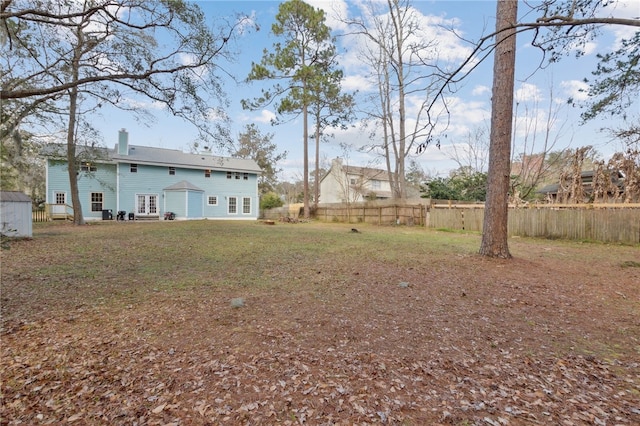 view of yard with fence
