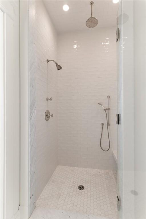 bathroom with an enclosed shower