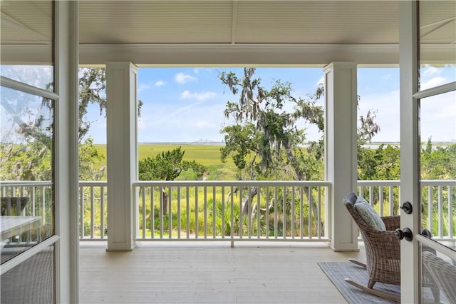 sunroom featuring french doors