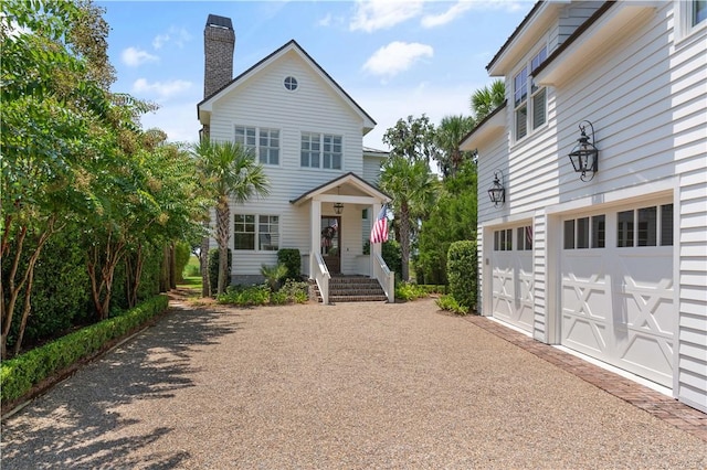 view of front of property with a garage