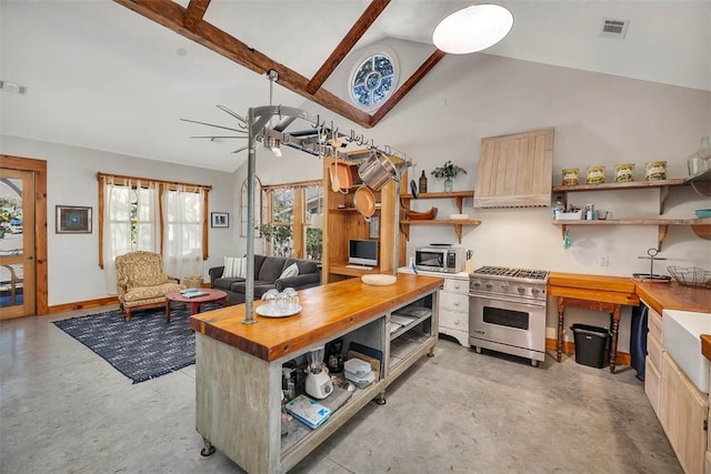 1106 George Lotson Ave, Saint Simons Island, GA 31522 - kitchen featuring finished concrete flooring, butcher block counters, visible vents, open shelves, and appliances with stainless steel finishes