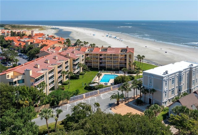 aerial view featuring a water view and a beach view