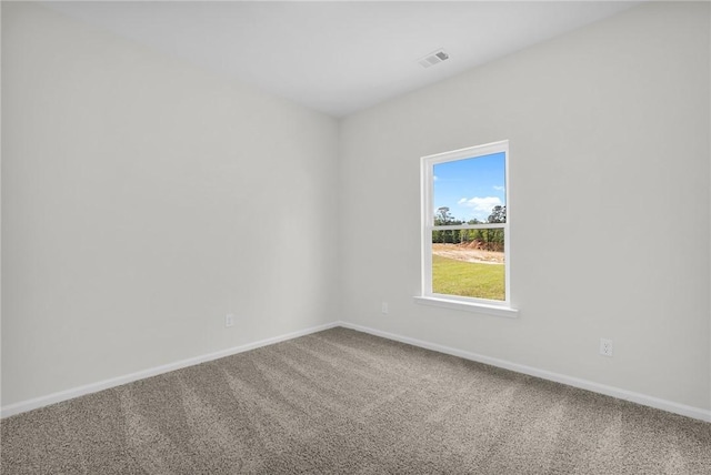 11026 Woodland Trl, Brunswick, GA 31525 - carpeted empty room featuring baseboards