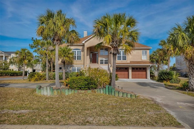 view of front of home with a garage