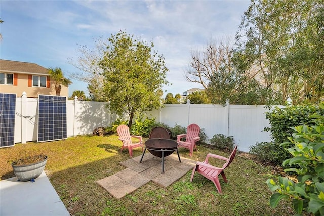 view of yard featuring a fire pit and cooling unit