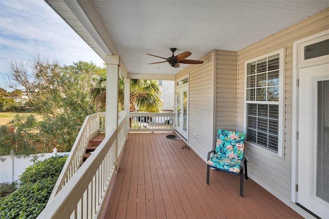 wooden terrace with ceiling fan