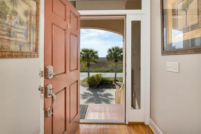 doorway with light hardwood / wood-style floors