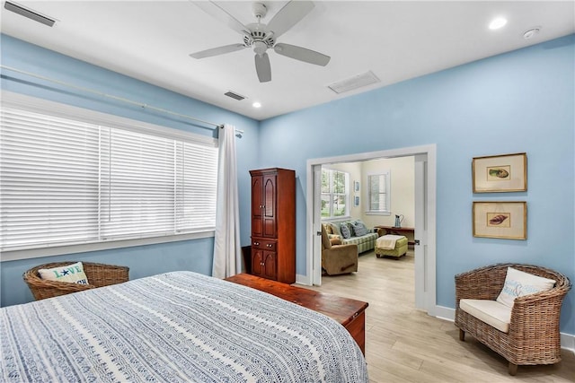 bedroom featuring ceiling fan and light wood-type flooring