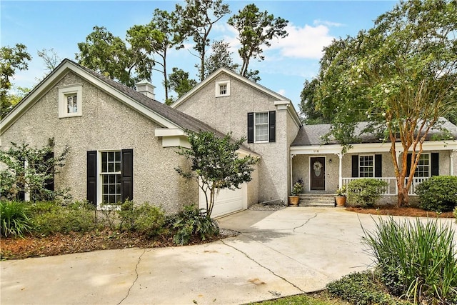 front of property with a garage