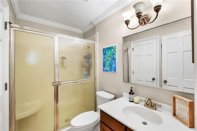 bathroom with crown molding, vanity, an enclosed shower, and a textured ceiling