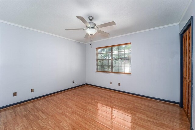 1501 Charles St, Waycross, GA 31501 - spare room featuring wood finished floors, ceiling fan, and ornamental molding