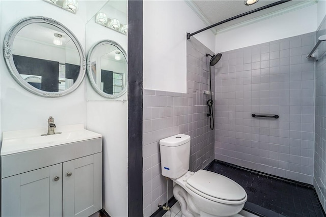 1501 Charles St, Waycross, GA 31501 - bathroom featuring crown molding, a tile shower, vanity, tile walls, and pet washing area