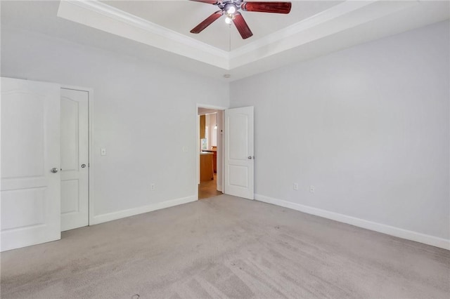 129 Taylor Wells Ln, Hinesville, GA 31313 - unfurnished bedroom featuring a tray ceiling, carpet flooring, baseboards, ceiling fan, and ornamental molding
