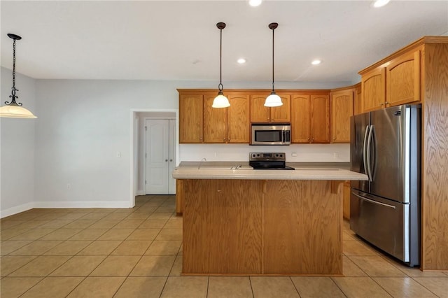 129 Taylor Wells Ln, Hinesville, GA 31313 - kitchen with light countertops, stainless steel appliances, recessed lighting, decorative light fixtures, and light tile patterned floors