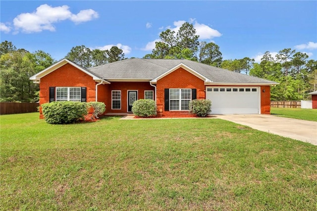 129 Taylor Wells Ln, Hinesville, GA 31313 - ranch-style home featuring fence, a front yard, an attached garage, and concrete driveway