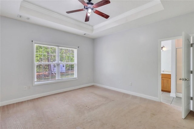 129 Taylor Wells Ln, Hinesville, GA 31313 - unfurnished room with baseboards, a tray ceiling, visible vents, and light carpet
