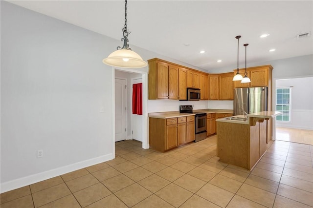 129 Taylor Wells Ln, Hinesville, GA 31313 - kitchen with light tile patterned flooring, visible vents, appliances with stainless steel finishes, and pendant lighting