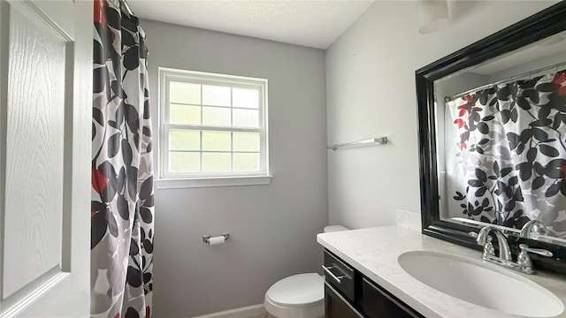 326 Daniel Trent Way, Kingsland, GA 31548 - full bath with vanity, toilet, baseboards, a shower with curtain, and a textured ceiling