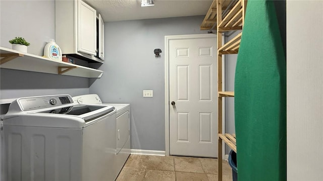 326 Daniel Trent Way, Kingsland, GA 31548 - laundry room featuring washer and clothes dryer, cabinet space, and baseboards