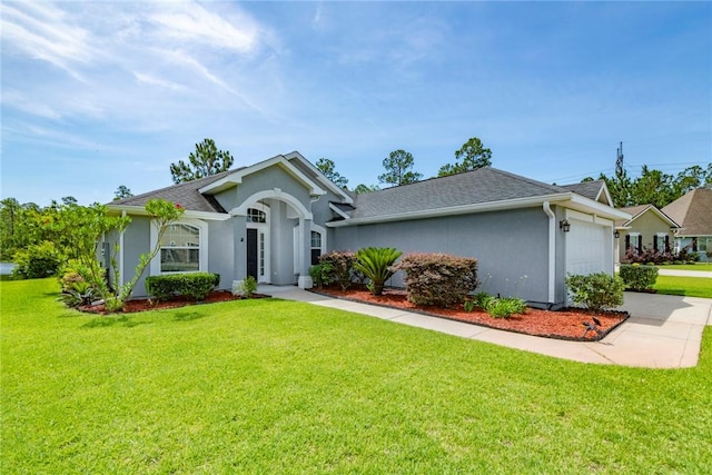 326 Daniel Trent Way, Kingsland, GA 31548 - single story home featuring stucco siding, an attached garage, a front yard, and concrete driveway