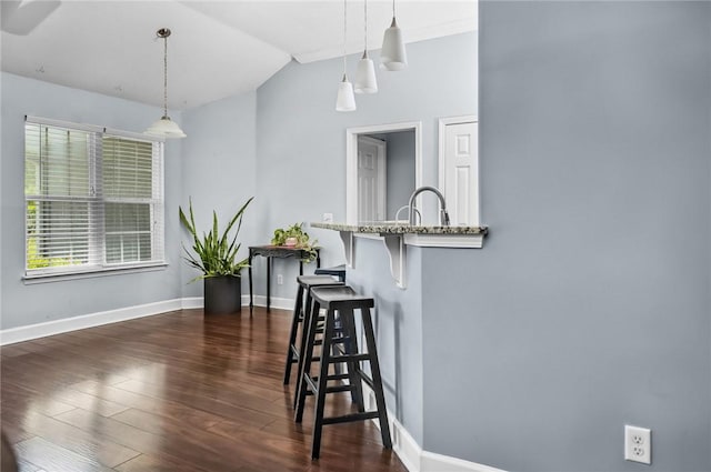 326 Daniel Trent Way, Kingsland, GA 31548 - dining area featuring baseboards, lofted ceiling, and dark wood finished floors