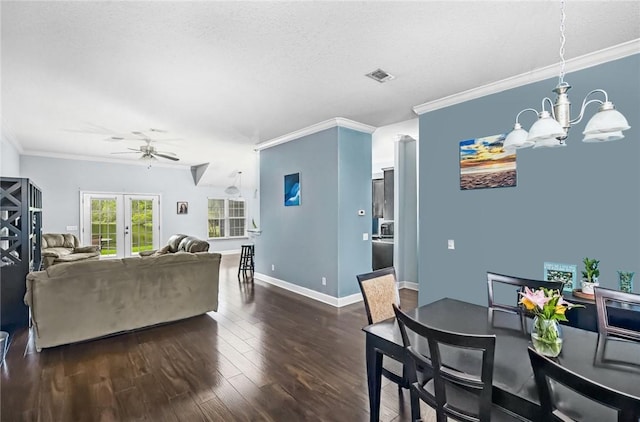 326 Daniel Trent Way, Kingsland, GA 31548 - living area with ornamental molding, dark wood-type flooring, ceiling fan, baseboards, and french doors