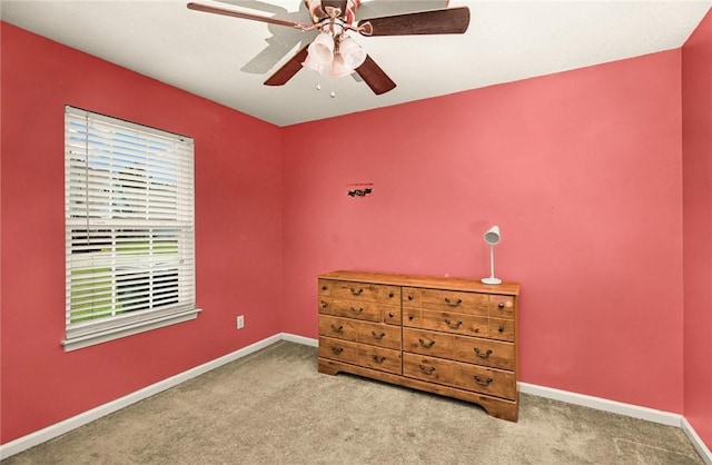 326 Daniel Trent Way, Kingsland, GA 31548 - carpeted bedroom featuring multiple windows, baseboards, and ceiling fan