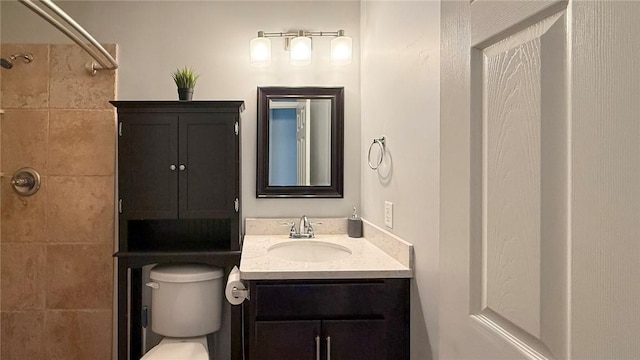 326 Daniel Trent Way, Kingsland, GA 31548 - bathroom with vanity, tiled shower, and toilet