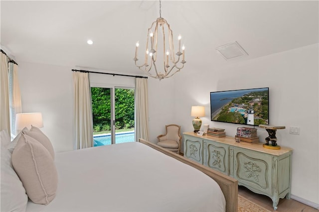 bedroom with access to outside, an inviting chandelier, visible vents, and recessed lighting