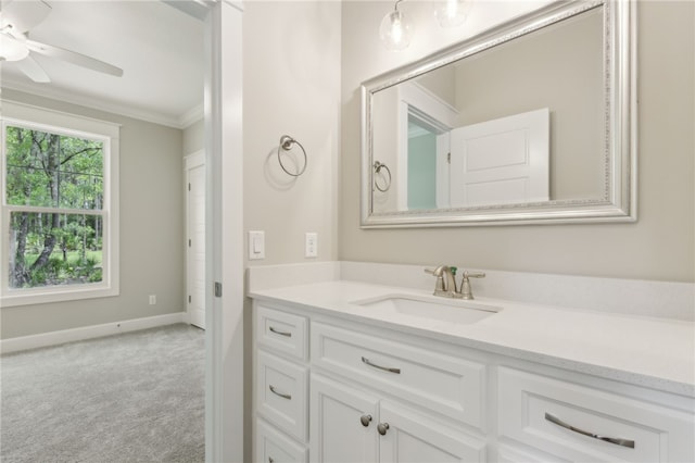 180 Ossabaw Way, Waverly, GA 31565 - bathroom with vanity, ornamental molding, and a ceiling fan