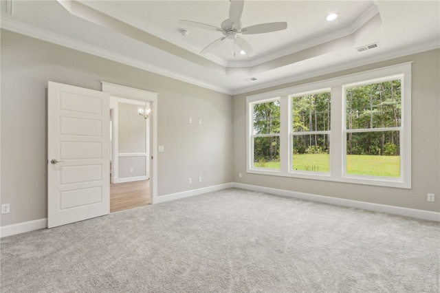 180 Ossabaw Way, Waverly, GA 31565 - carpeted empty room featuring a tray ceiling, ornamental molding, ceiling fan, and recessed lighting