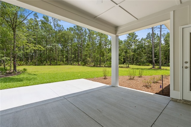180 Ossabaw Way, Waverly, GA 31565 - view of patio / terrace with view of wooded area