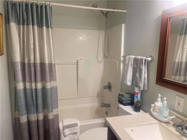 full bathroom with vanity, toilet, and shower / bath combo