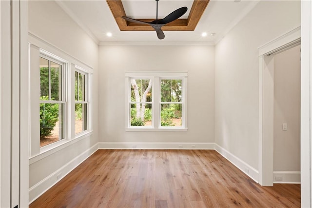 1241 Pikes Bluff Rd, Saint Simons Island, GA 31522 - spare room with wood finished floors, crown molding, and a tray ceiling