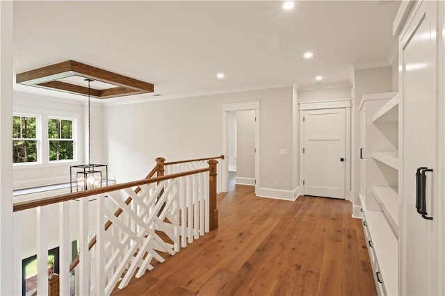 1241 Pikes Bluff Rd, Saint Simons Island, GA 31522 - hall with crown molding, an upstairs landing, recessed lighting, and light wood-type flooring
