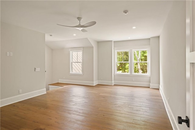 1241 Pikes Bluff Rd, Saint Simons Island, GA 31522 - empty room with a smoke detector, plenty of natural light, wood finished floors, ceiling fan, and recessed lighting