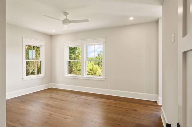 1241 Pikes Bluff Rd, Saint Simons Island, GA 31522 - spare room with hardwood / wood-style flooring, a ceiling fan, and recessed lighting