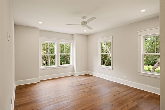 1241 Pikes Bluff Rd, Saint Simons Island, GA 31522 - unfurnished room with wood finished floors, a ceiling fan, and recessed lighting
