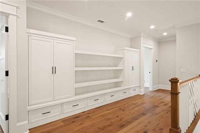 1241 Pikes Bluff Rd, Saint Simons Island, GA 31522 - mudroom with crown molding, light wood-style floors, and recessed lighting