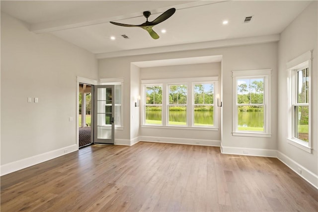 1241 Pikes Bluff Rd, Saint Simons Island, GA 31522 - unfurnished sunroom featuring beam ceiling and a water view