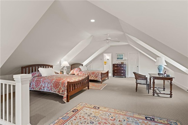 bedroom featuring carpet floors, vaulted ceiling, and ceiling fan