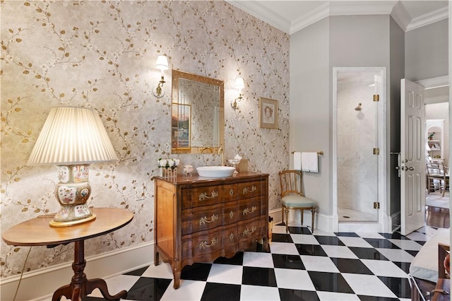 bathroom with vanity, a shower with door, and crown molding