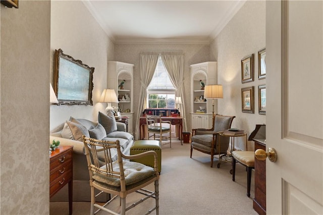 sitting room featuring ornamental molding and light carpet