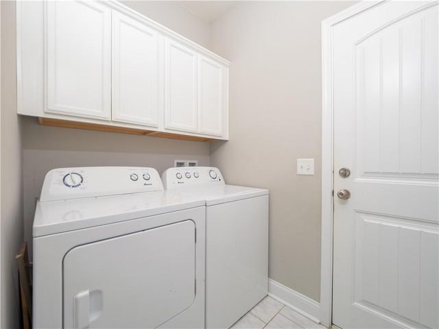 laundry room with cabinets and independent washer and dryer