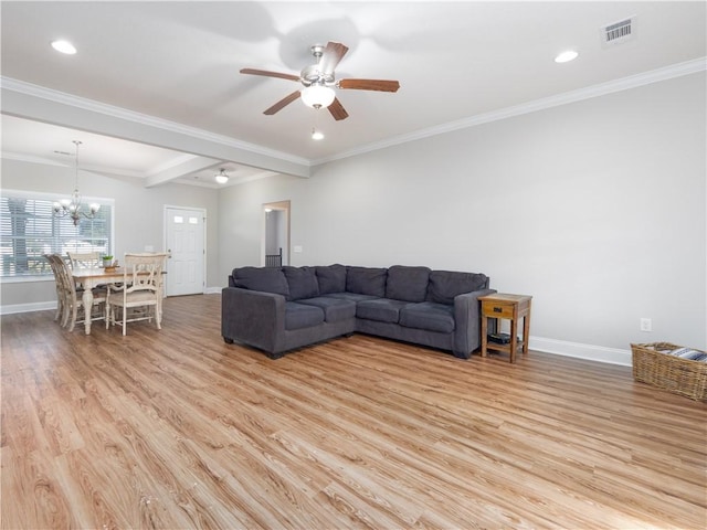 living room with ornamental molding, ceiling fan with notable chandelier, and light wood-type flooring