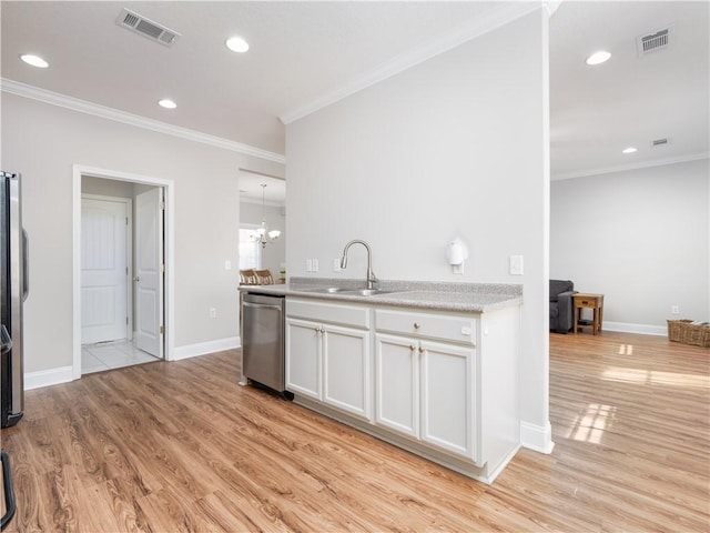 kitchen featuring sink, light hardwood / wood-style flooring, appliances with stainless steel finishes, white cabinetry, and ornamental molding