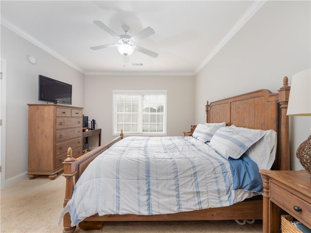 bedroom featuring light carpet, ornamental molding, and ceiling fan