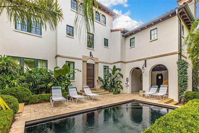 rear view of house with a patio area