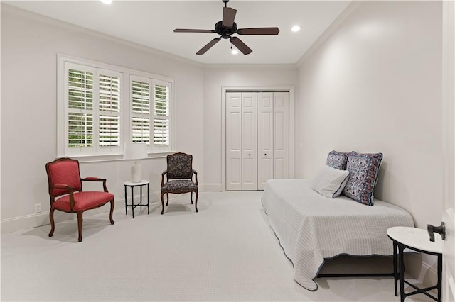 carpeted bedroom featuring recessed lighting, a closet, a ceiling fan, ornamental molding, and baseboards