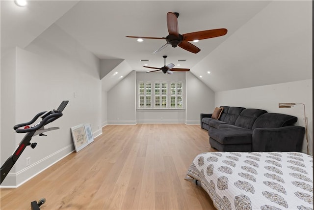 bedroom with recessed lighting, vaulted ceiling, ceiling fan, light wood-type flooring, and baseboards